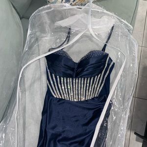 A beautiful navy blue long dress, Size M for girls between 5’5 to 5’8 ft tall